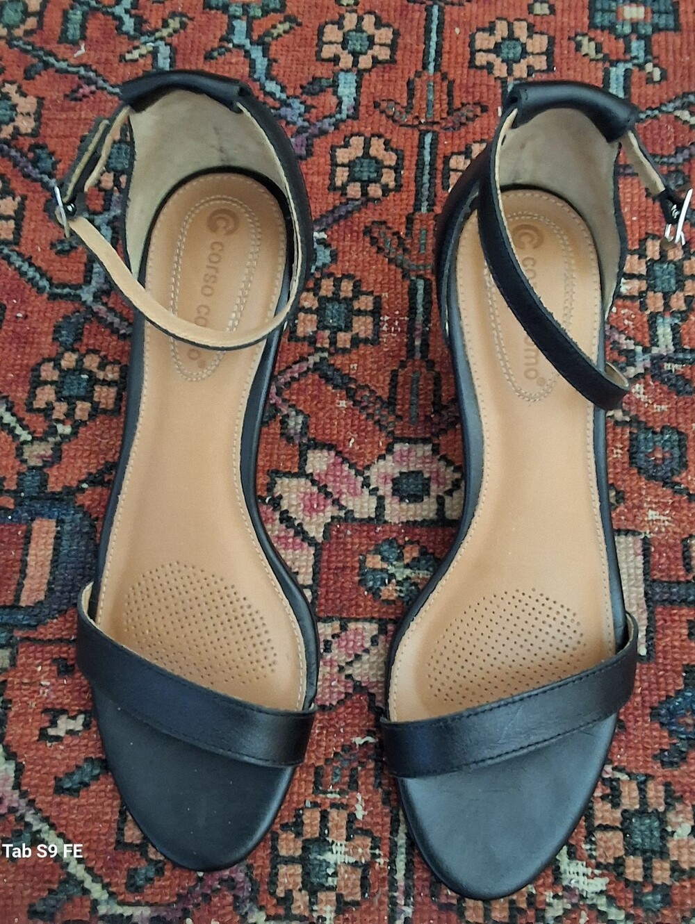 Corso Como Black Leather Ankle-Strap Sandals. Milan-based.